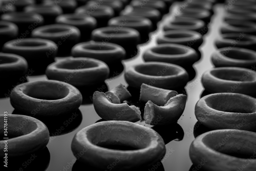 Obraz premium Russian bagels lie on the table in rows. Black and white photo.