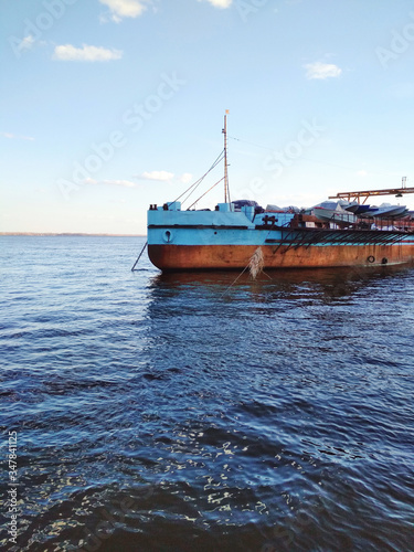 Ship barge Volga river embankment blue water sky summer nature photo © Silmairel