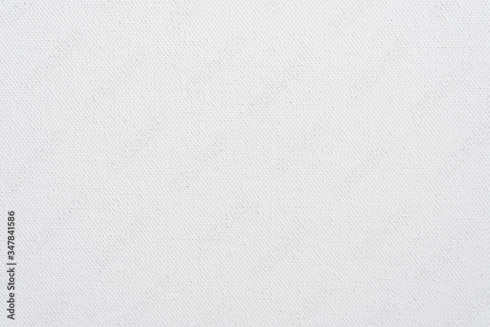 Naklejka premium White canvas texture background. Close-up.