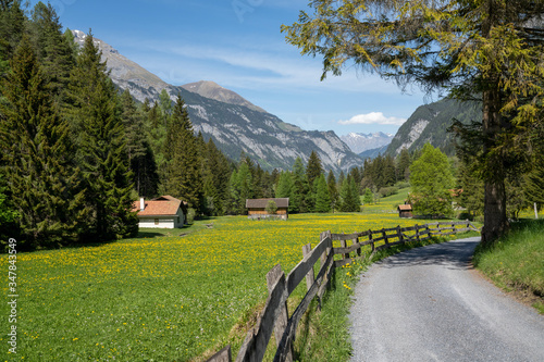 view of an idyllic mountain valley in the heart of the Swiss Alps