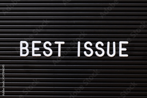 Black color felt letter board with white alphabet in word best issue background