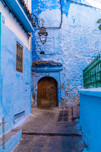 Chefchaouen street old door Morocco © juliaggmm