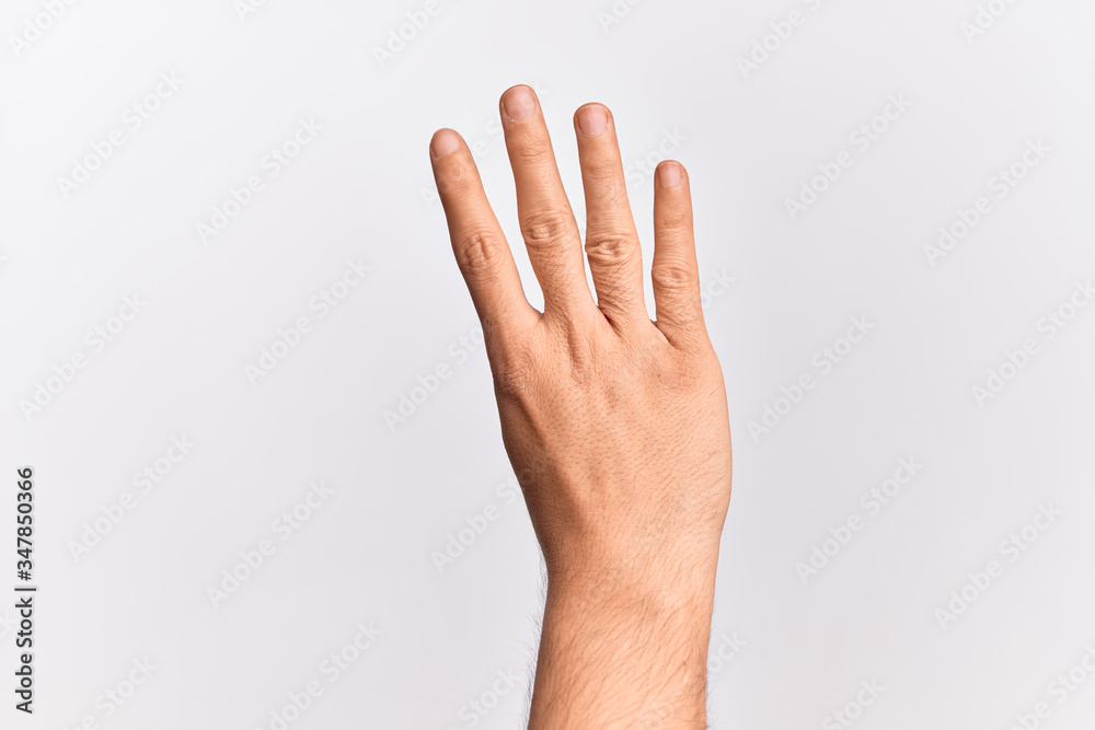 Hand of caucasian young man showing fingers over isolated white background counting number 4 showing four fingers Hand of caucasian young man showing fingers over isolated white background counting number 4 showing four fingers