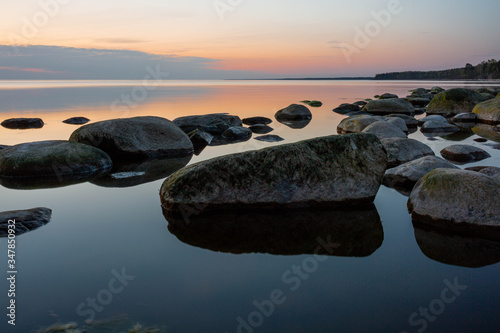 City Tuja, Latvia. Baltic sea with rocks and sunshine. Travel photo.