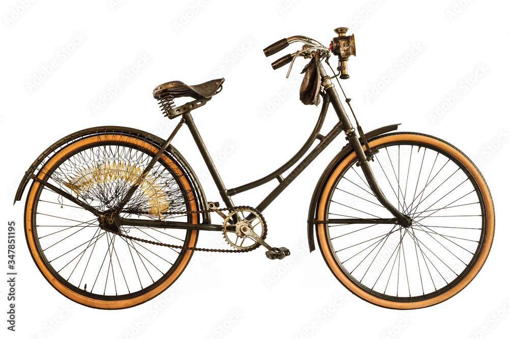Vintage early twentieth century Dutch women's bicycle with lantern isolated on white
