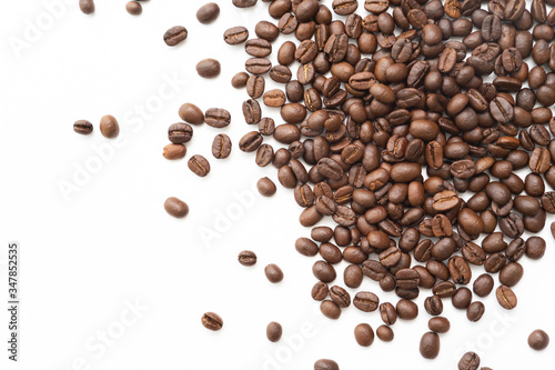 Coffee beans isolated on white background. Close up.