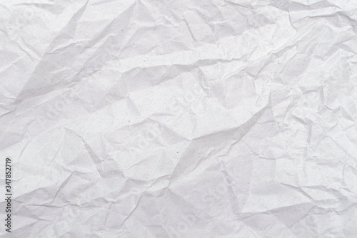 White crumpled paper texture. Abstract paper pattern for background. Close-up.