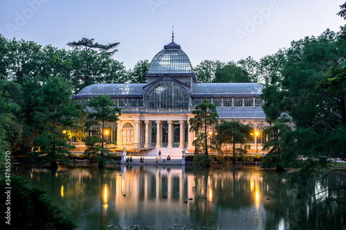 night blue hour cristal palace in biggest park of madrid capital city