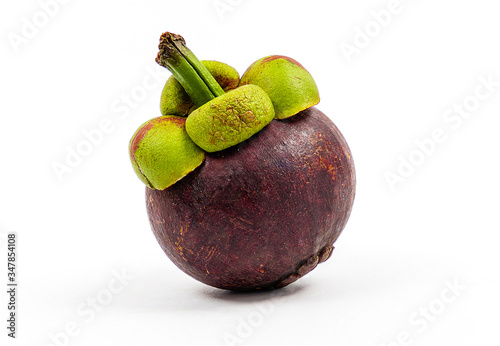 mangosteen fruits placed on a white background. photo
