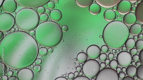 Colorful artistic of oil drop floating on the water.