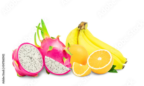 Tropical fruits, banana and orange and Dragon fruit with cut in half and slice isolated on white background with clipping path