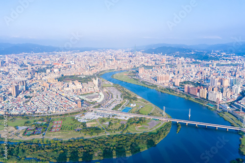 Taipei City Aerial View - Asia business concept image  panoramic modern cityscape building bird   s eye view under daytime and blue sky  shot in Taipei  Taiwan.
