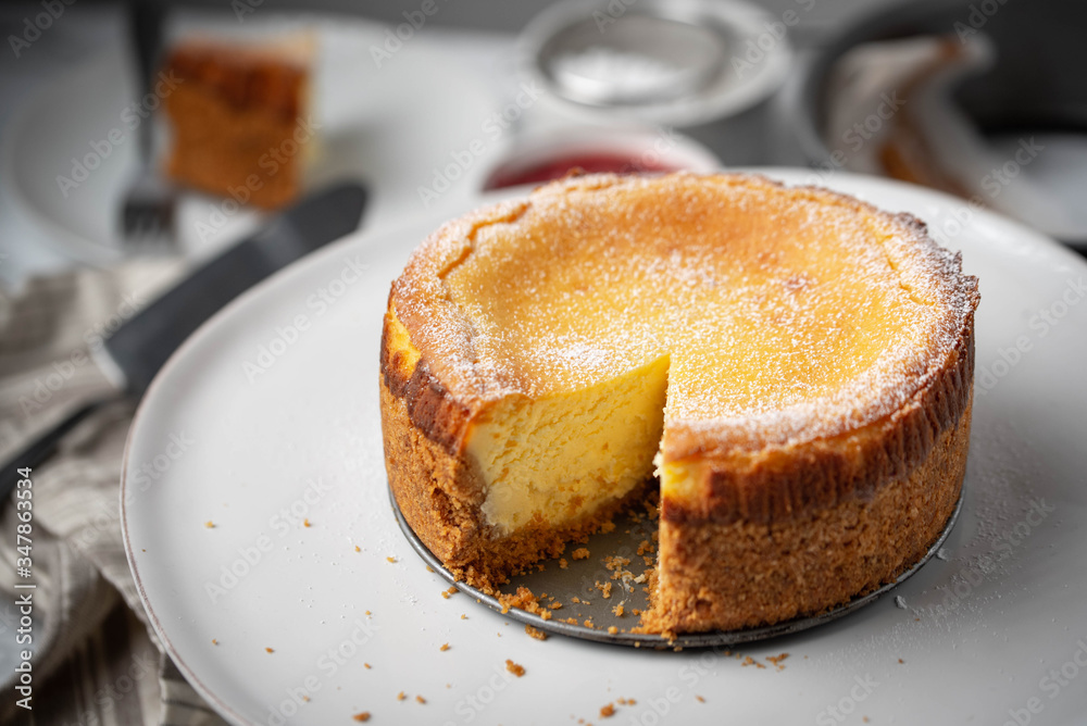 new york style cheesecake on marble background new york style cheesecake on marble background