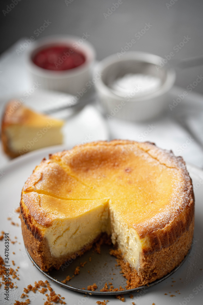 new york style cheesecake on marble background new york style cheesecake on marble background
