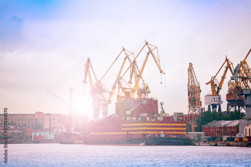 Admiralty Shipyard or Admiralteyskiye Verfi, with construction cranes and deadweight, Saint Petersburg, Russia
