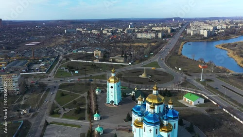 Ukraine Transfiguration Cathedral, Kryvoyi Rih. Mining in the open-pit mine around the industrial city photo