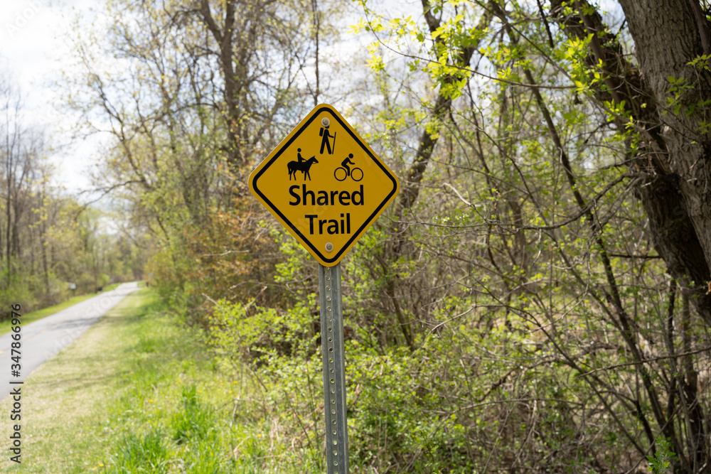 Shared Trail (hiking, biking, and horseback riding activities) sign in Elm Creek Park Reserve in Maple Grove, MN