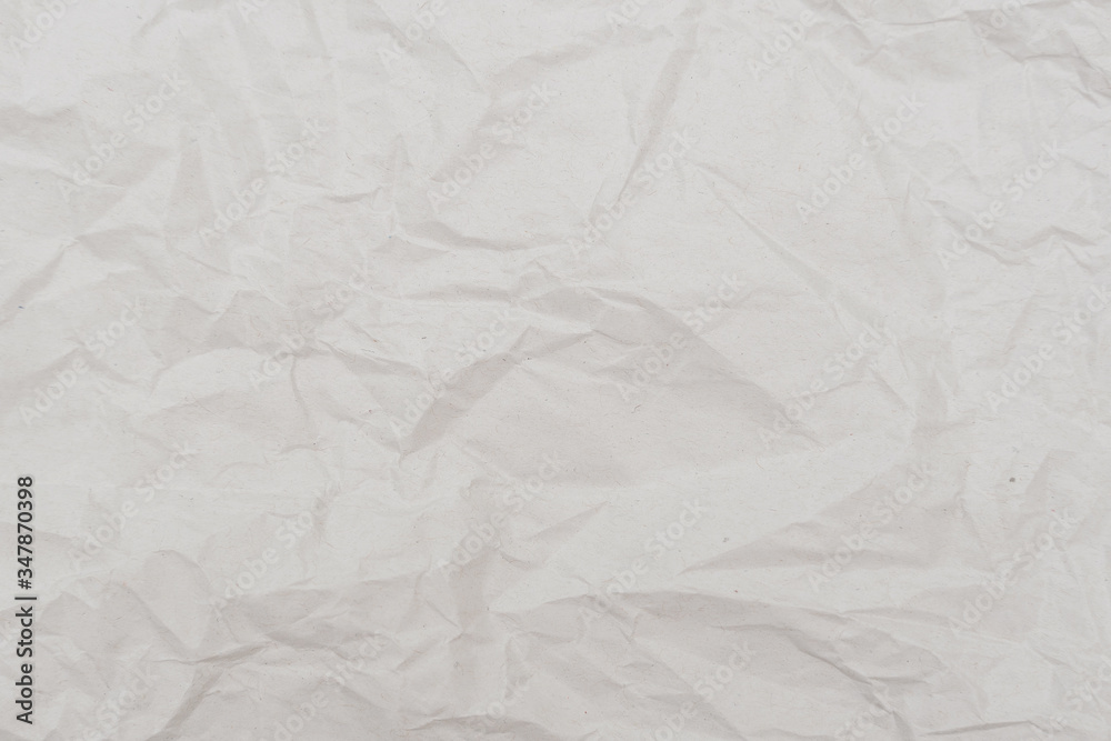 Naklejka premium White crumpled paper texture. Abstract paper pattern for background. Close-up.