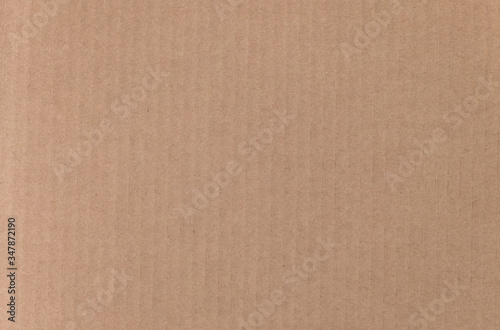 Brown cardboard sheet texture background. Texture of recycle paper box in old vintage pattern background.