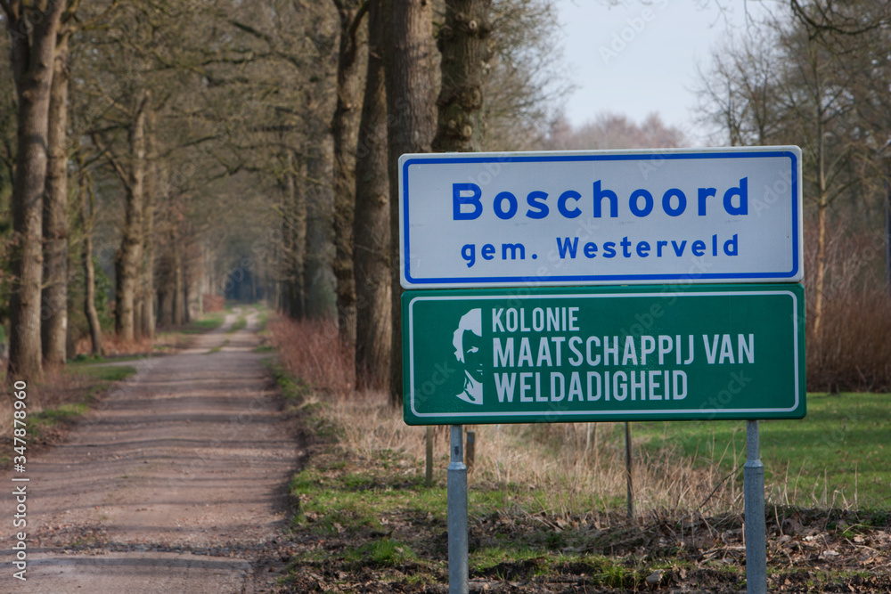Lane and signs at Boschoord Maatschappij van Weldadigheid Frederiksoord Netherlands. 
