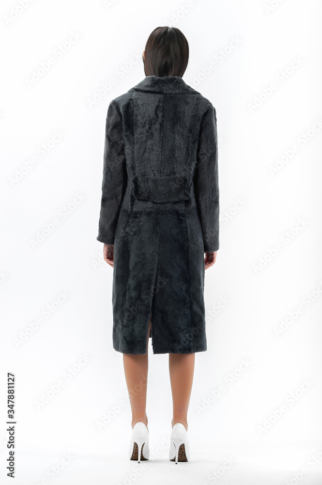 girl in a fur coat on a white background for a catalog girl in a fur coat on a white background for a catalog