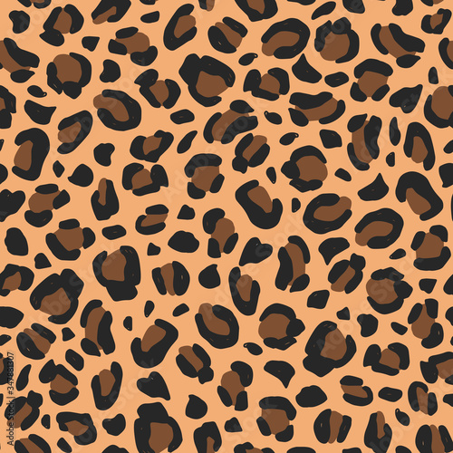 Leopard vector hand-drawn seamless pattern. Animal print background