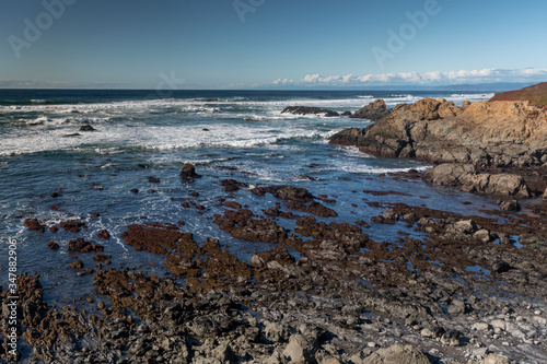Long exposure of glass beach area in Mendocino  California  USA  Glass Beach area  featuring rocky landscape and blue hues