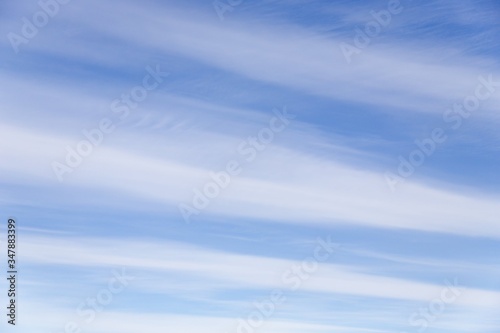 Canvas Print Blue sky with white stripes. Striped sky