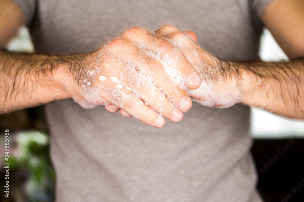 Washing hands rubbing with soap man for corona virus prevention, hygiene to stop spreading coronavirus Washing hands rubbing with soap man for corona virus prevention, hygiene to stop spreading coronavirus