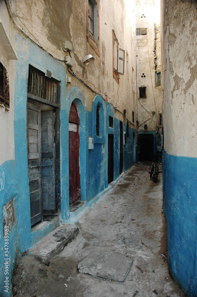 Bike in a colored little street in the souk of Marrakech near the Jemaa el-Fna market square