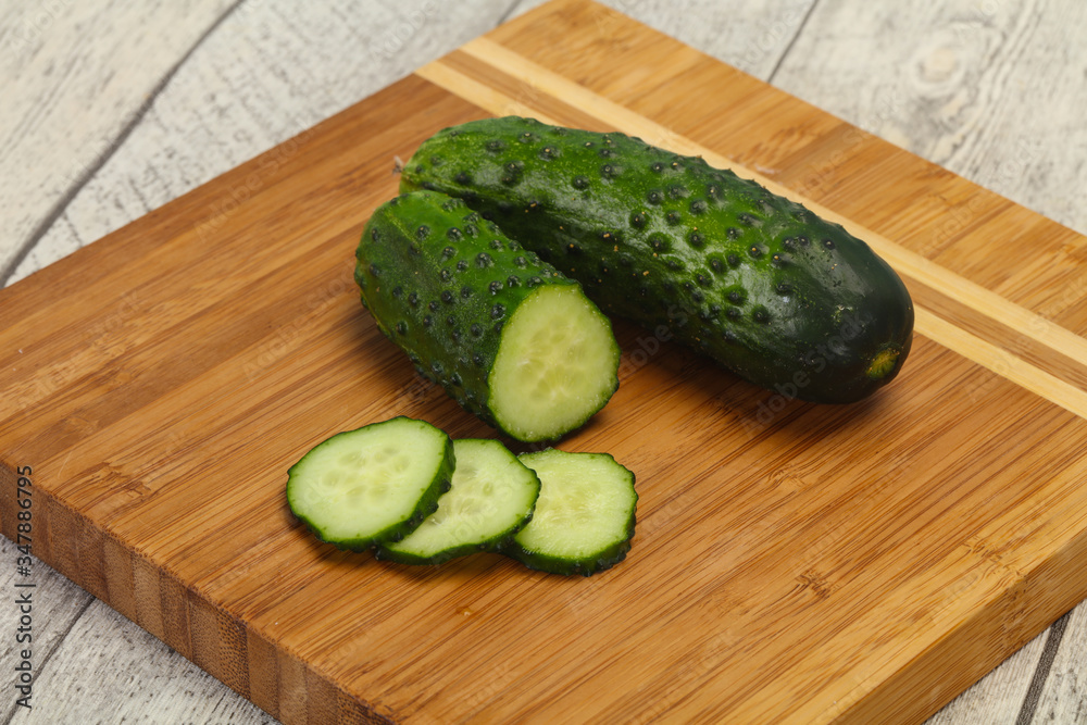 Ripe fresh green two cucumbers Ripe fresh green two cucumbers