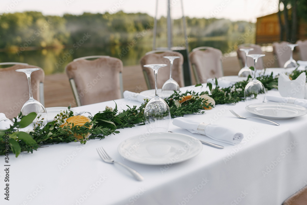 Fototapeta premium Gala dinner on the open veranda by the river