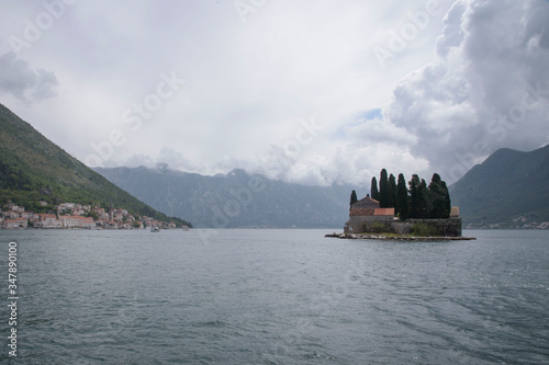 View from the island of Our Lady of the Rock, of the Island of Saint George in the Bay of Kotor in the Adriatic, Montenegro, Europe.