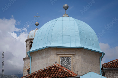 Dome of the Church on the island of Our Lady of the Rock, in the bay of Kotor in the Adriatic, Montenegro, Europe. photo