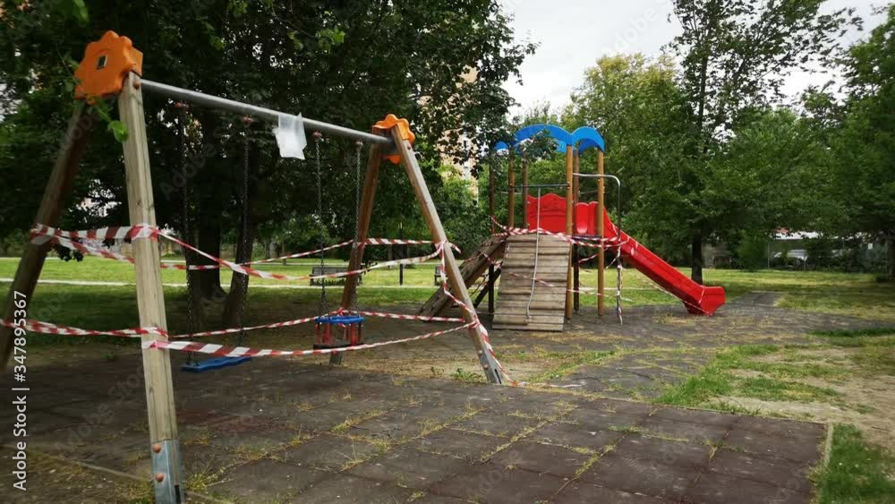 empty playground closed for coronavirus covid-19 virus outbreak quarantine deserted with no people empty playground closed for coronavirus covid-19 virus outbreak quarantine deserted with no people