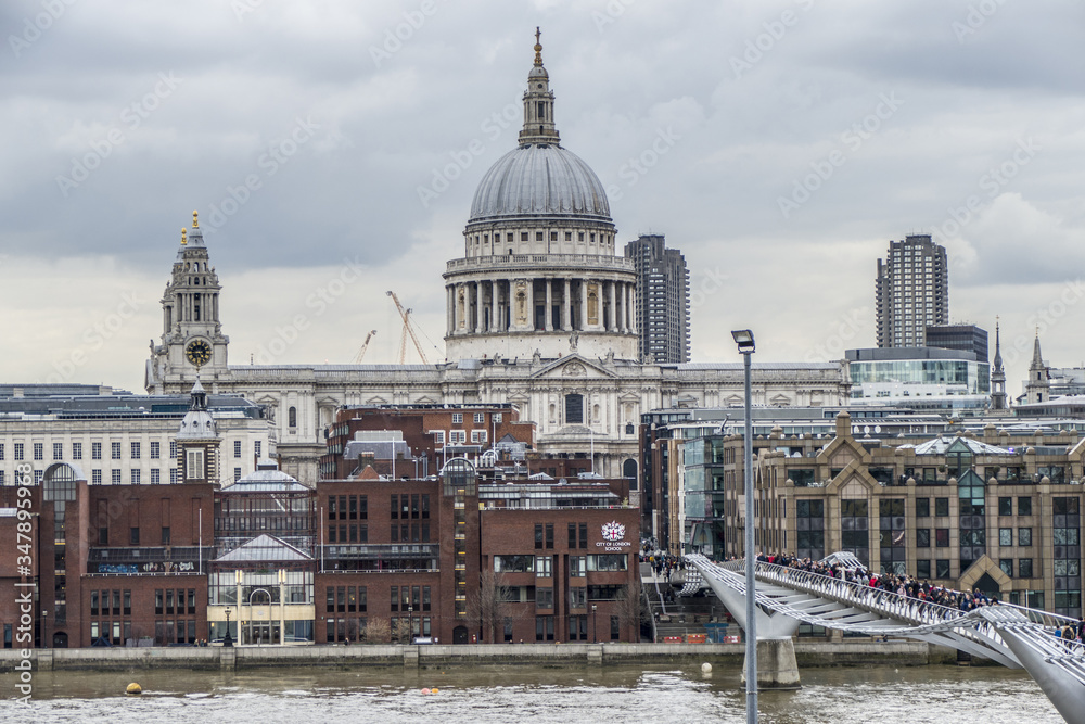 The Millennium Bridge in London with St. Paul Cathedral in background