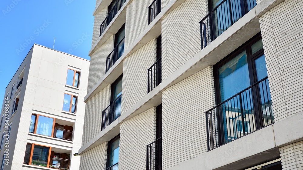 Modern residential architecture in summer. Modern city. Modern residential architecture in summer. Modern city.