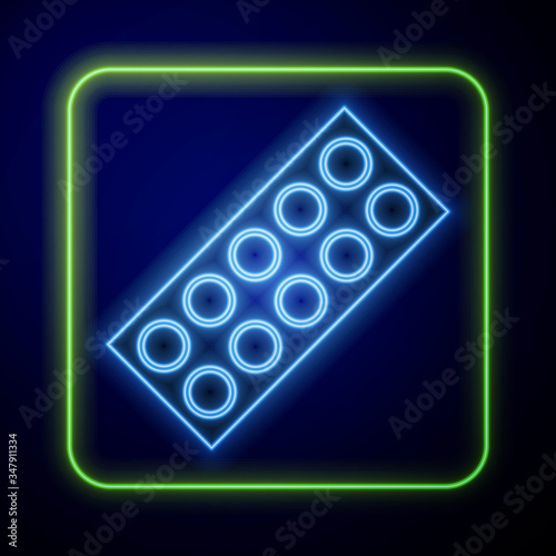 Glowing neon Pills in blister pack icon isolated on blue background. Medical drug package for tablet, vitamin, antibiotic, aspirin