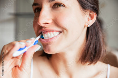 Tooth Pain And Dentistry. Beautiful Young Woman Suffering From Terrible Strong Teeth Pain  Touching Cheek With Hand. Female Feeling Painful Toothache. Dental Care And Health Concept.teeth cleaning