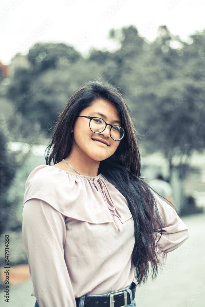 Young girl smiling and posing 