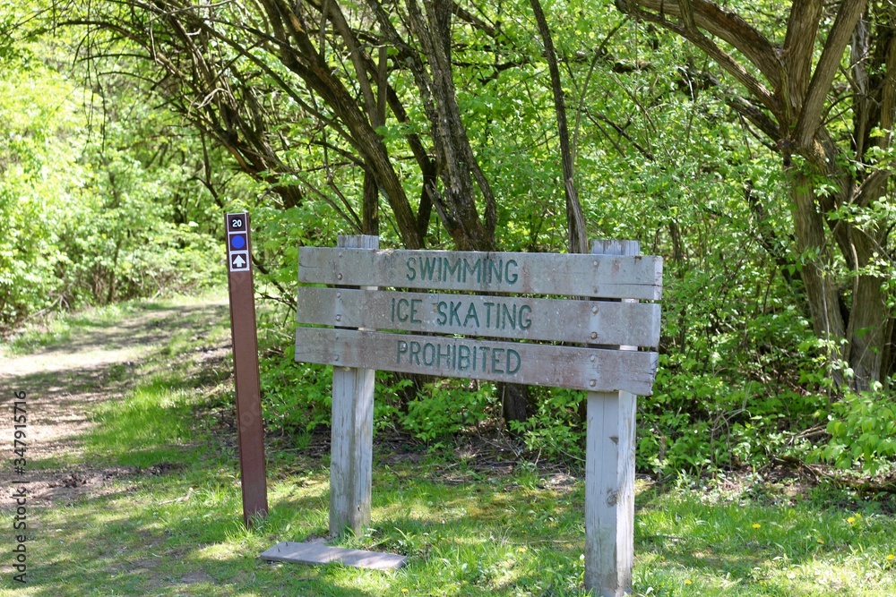 A close view of the old wood information sign. A close view of the old wood information sign.