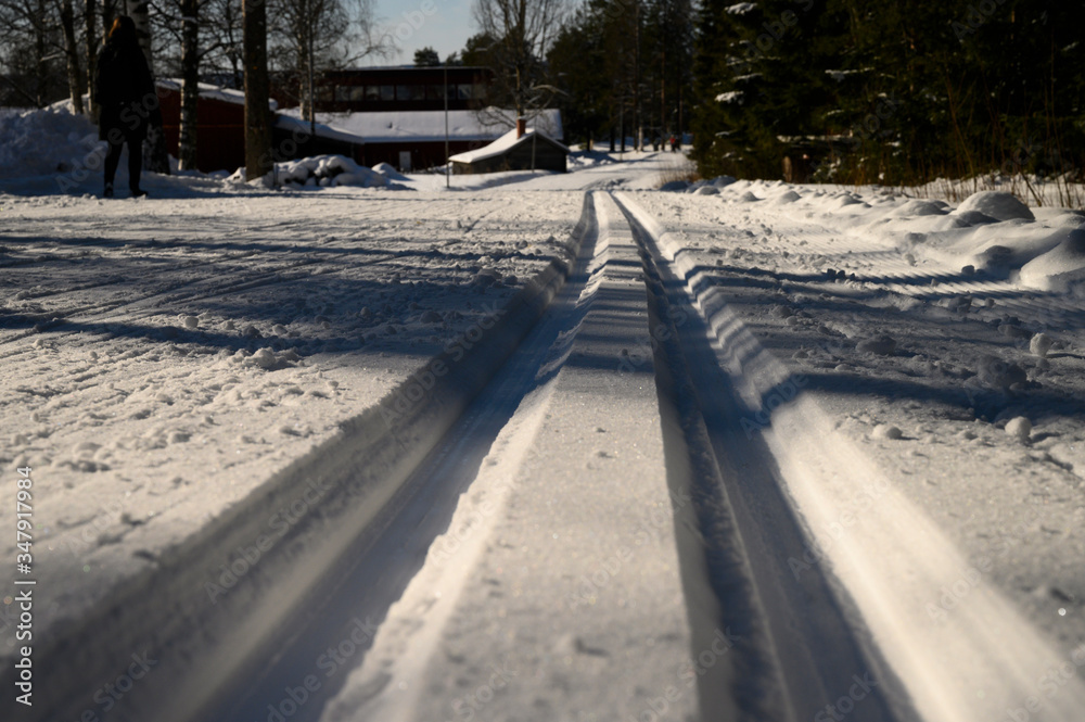 Close view of ski track in cross country ski zone during the winter