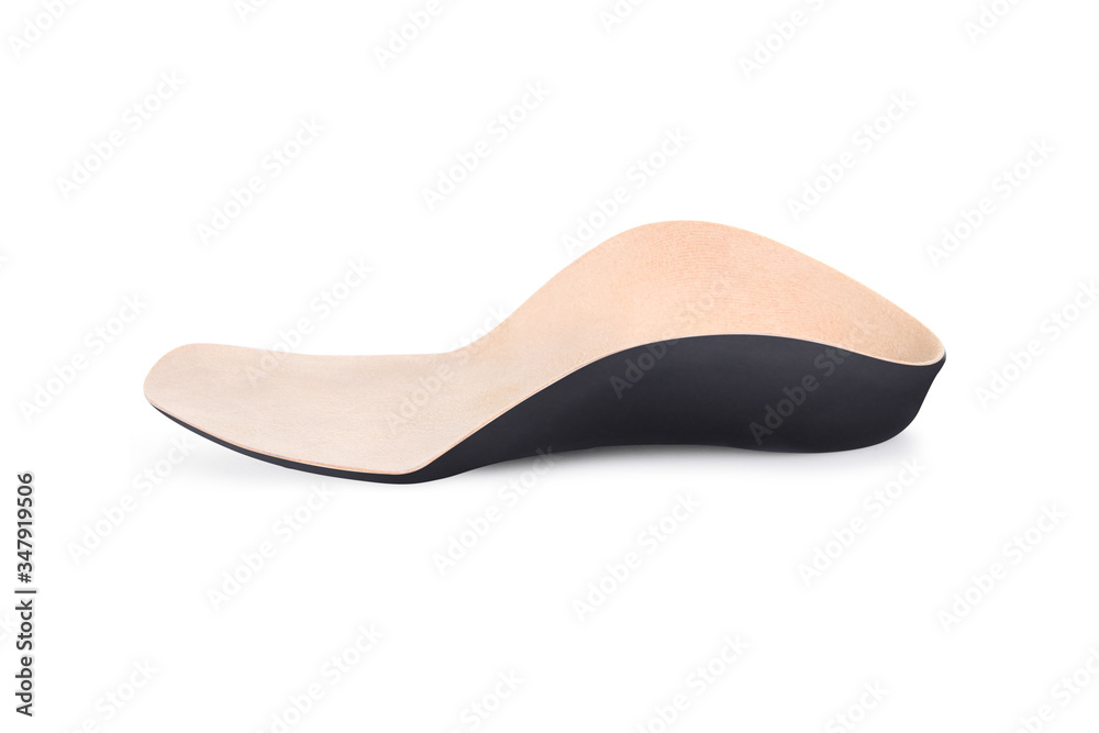 Isolated orthopedic insole on a white background. Treatment and prevention of flat feet and foot diseases. Foot care, comfort for the feet. Wear comfortable shoes. Medical insoles. Flat Feet Correctio Isolated orthopedic insole on a white background. Treatment and prevention of flat feet and foot diseases. Foot care, comfort for the feet. Wear comfortable shoes. Medical insoles. Flat Feet Correctio