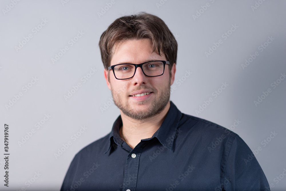 Obraz premium Young businessman with shirt and blue eyes