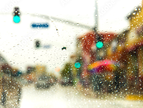 A rainstorm leaves water droplets on a windshield in this abstract bokeh photo taken in Downtown Los Angeles on an unusually rainy day. 