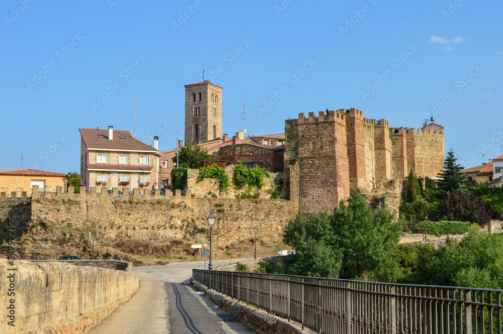 view of the town of Buitrago de Lozoya. Spain with the ramparts and the church bell tower in the background