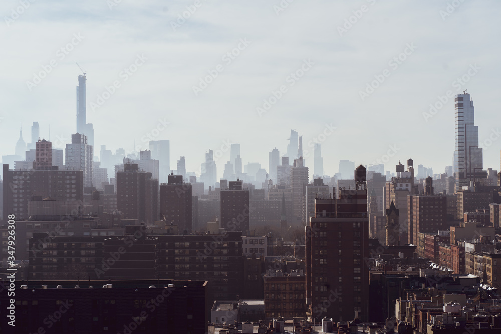 A beautiful image capturing the New York City Skyline from the rooftop of The Cathedral Church of St. John the Divine.