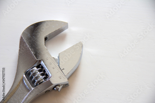 Male tools. Mechanic hand hold spanner tool. close up Happy Father's Day inscription with on white background. Greetings and presents. white card with the ability to insert text, copyspace, 
