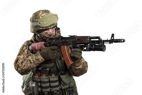 Ukraine officer in mechanized infantry uniform isolated with clipping path on white background. (Flag and arms of Ukraine on the shoulder. Patch on the chest with the inscription Ukraine in Ukrainian)