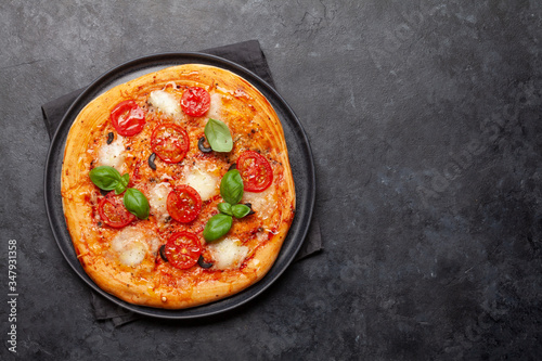 Tasty homemade pizza with tomatoes